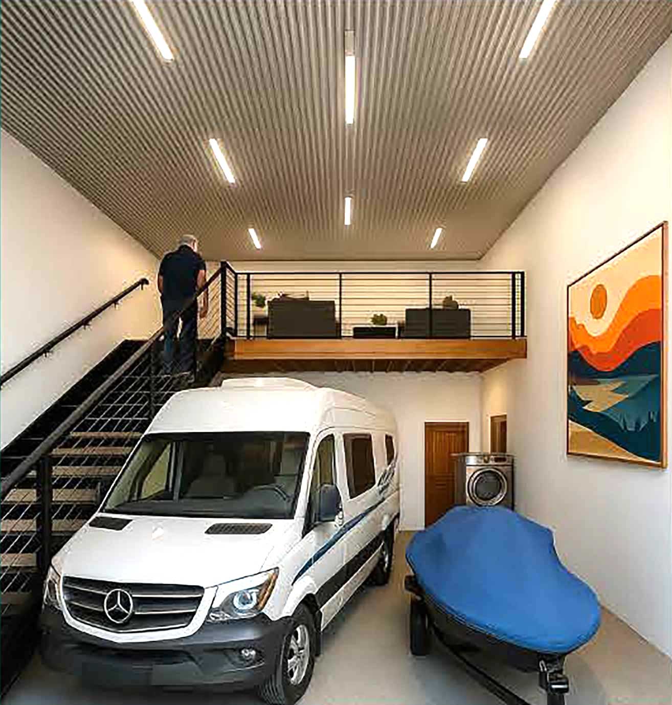 Interior of Hideaway Haus garage suite with RV, boat storage, and mezzanine | Luxury Garage Condos in Bullhead City